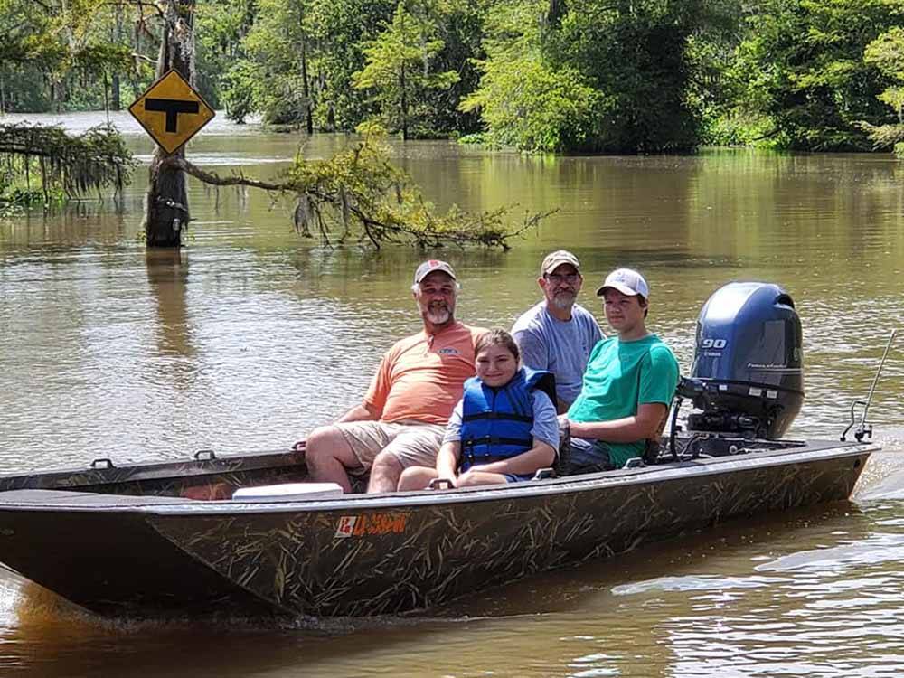 Family in a fishing boat on the water at CAJUN COAST VISITORS & CONVENTION BUREAU