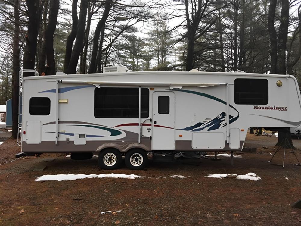 Parked RV at site Royal Mountain Campground