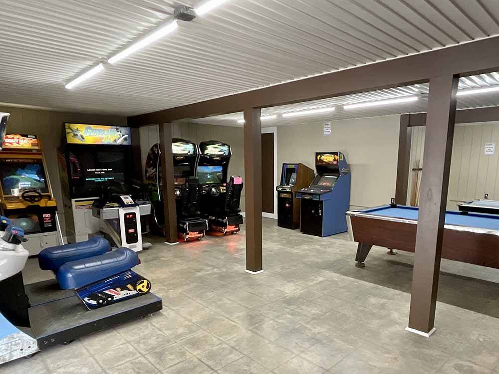 The arcade room with a pool table at COLD SPRINGS CAMP RESORT