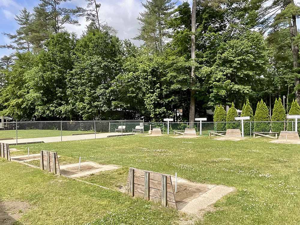 A row of horseshoe pits at COLD SPRINGS CAMP RESORT
