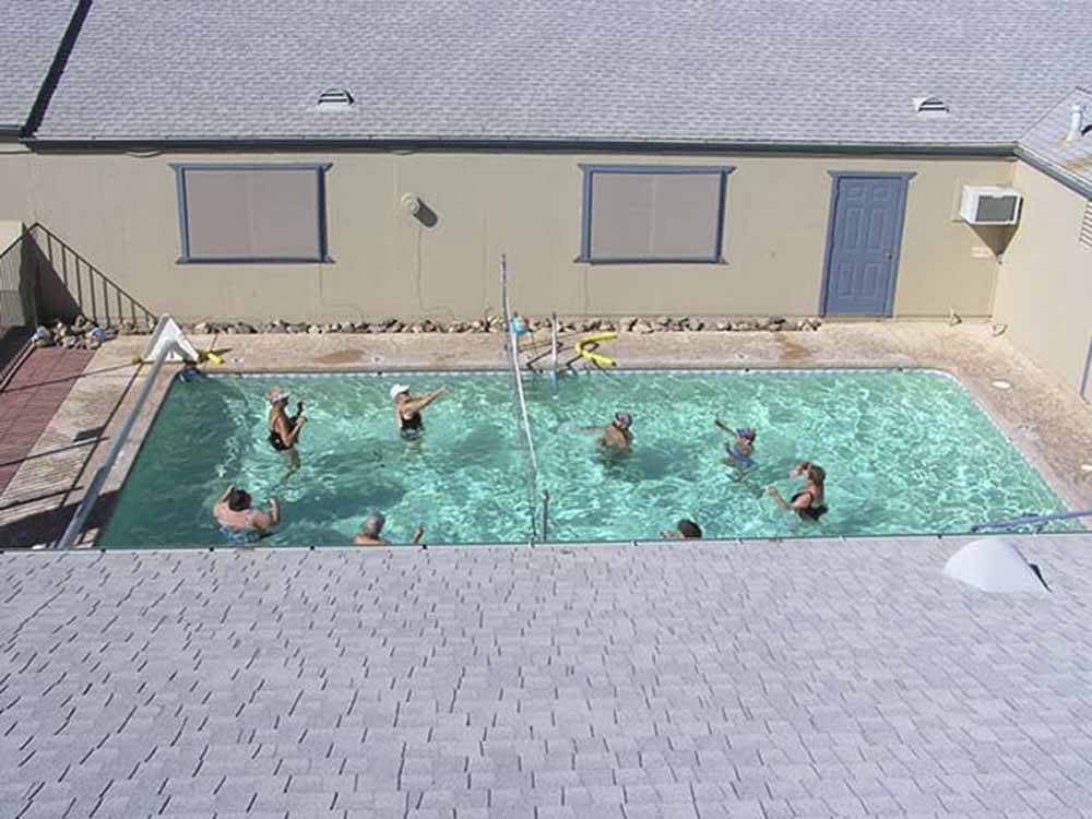 An aerial view of the swimming pool at DESERT GOLD RV RESORT