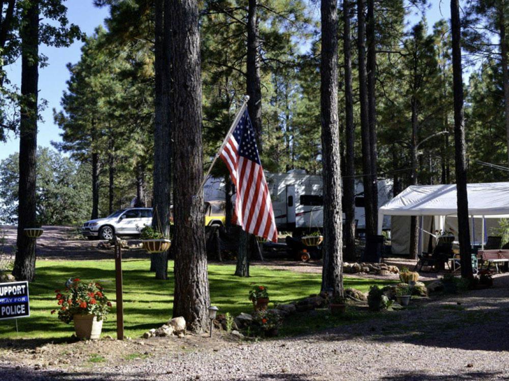 American flag in the trees at HAPPY JACK LODGE & RV RESORT