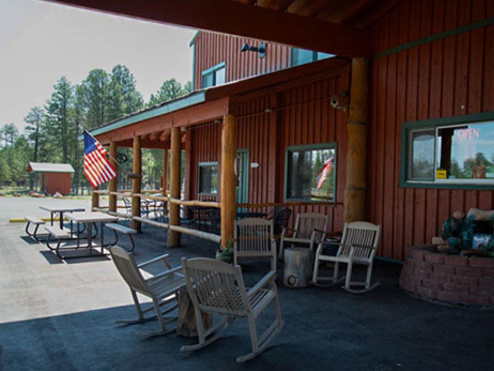 Chairs on a porch at HAPPY JACK LODGE & RV RESORT