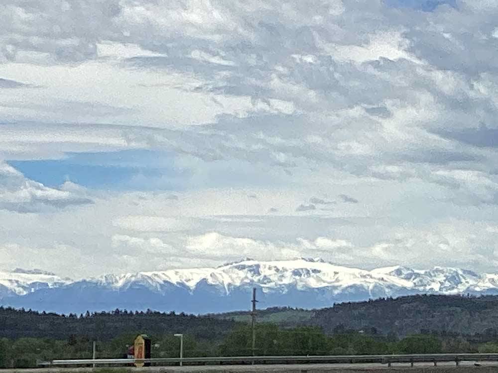 The snow covered mountains at MOUNTAIN RANGE RV PARK