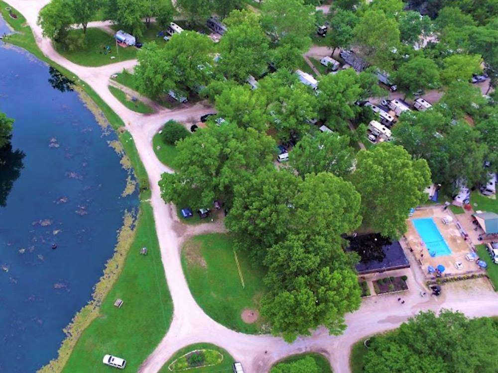 Aerial view over campground and lake at PIN OAK RV RESORT BY RJOURNEY