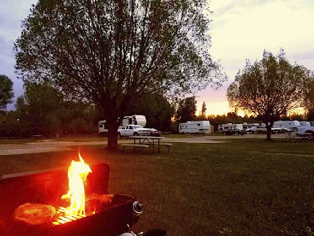 A fire in a barbecue pit at FORT BRIDGER RV PARK