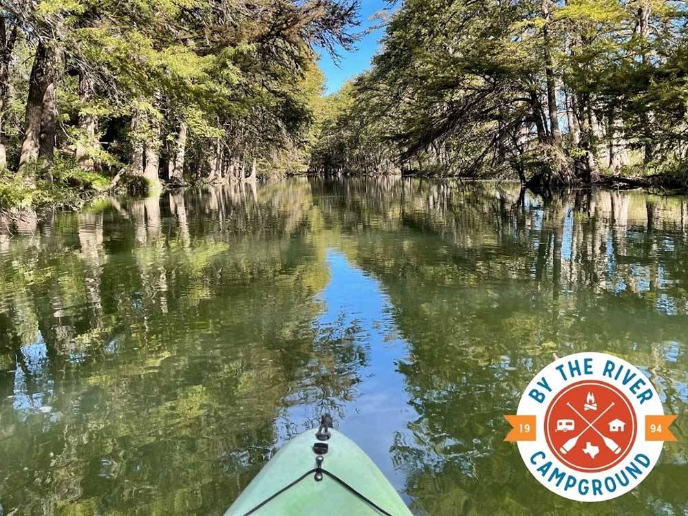 A kayak on the river at BY THE RIVER RV PARK & CAMPGROUND