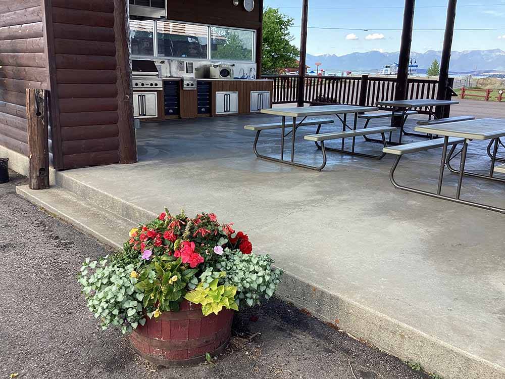 The picnic tables at the registration building at FLATHEAD HARBOR RV, LUXURY CONDOS AND CABINS (FORMERLY EDGEWATER RESORT)