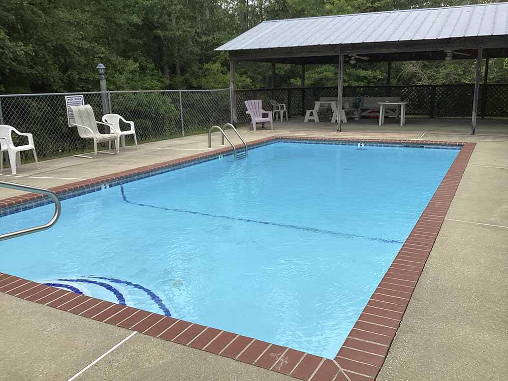 The swimming pool area at COUNTRY SIDE RV PARK