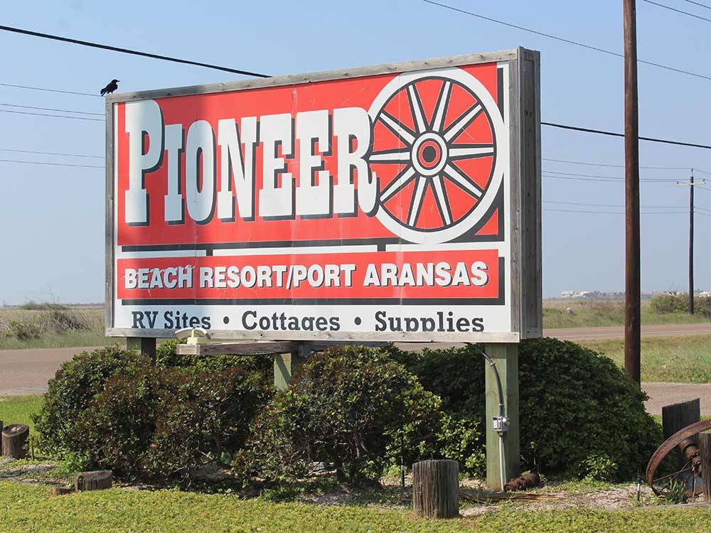The large entrance sign at PIONEER BEACH RESORT