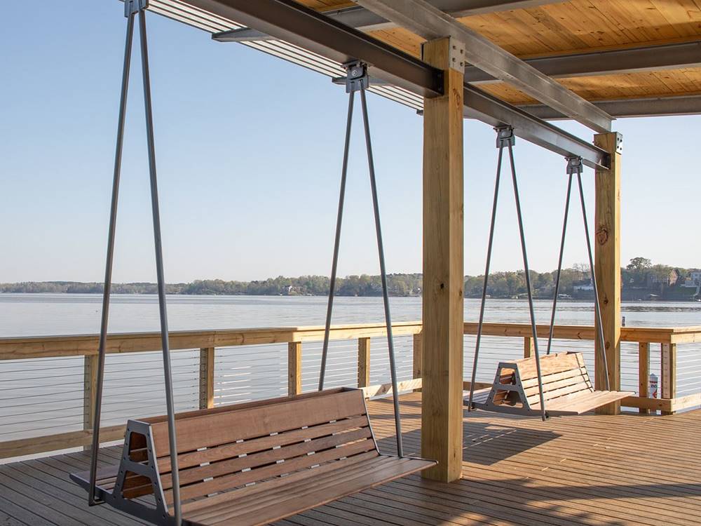 Swinging benches at the lakeshore at Ebenezer Park