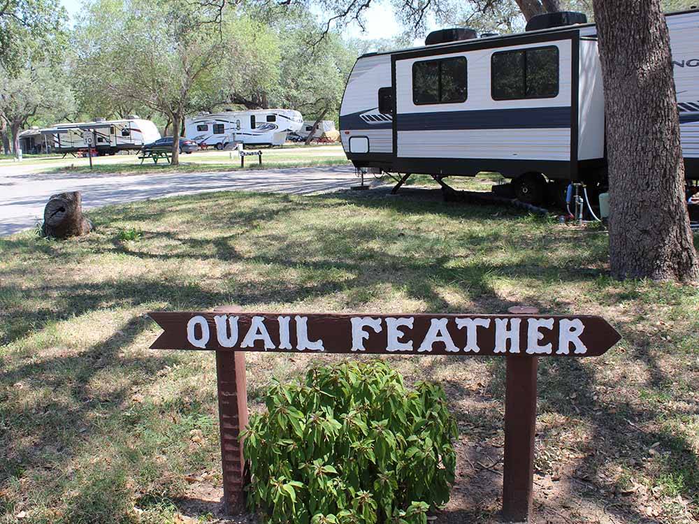 A sign of Quail Feather at QUAIL SPRINGS RV PARK