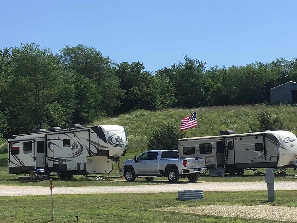 A couple of trailers at COZY C RV CAMPGROUND