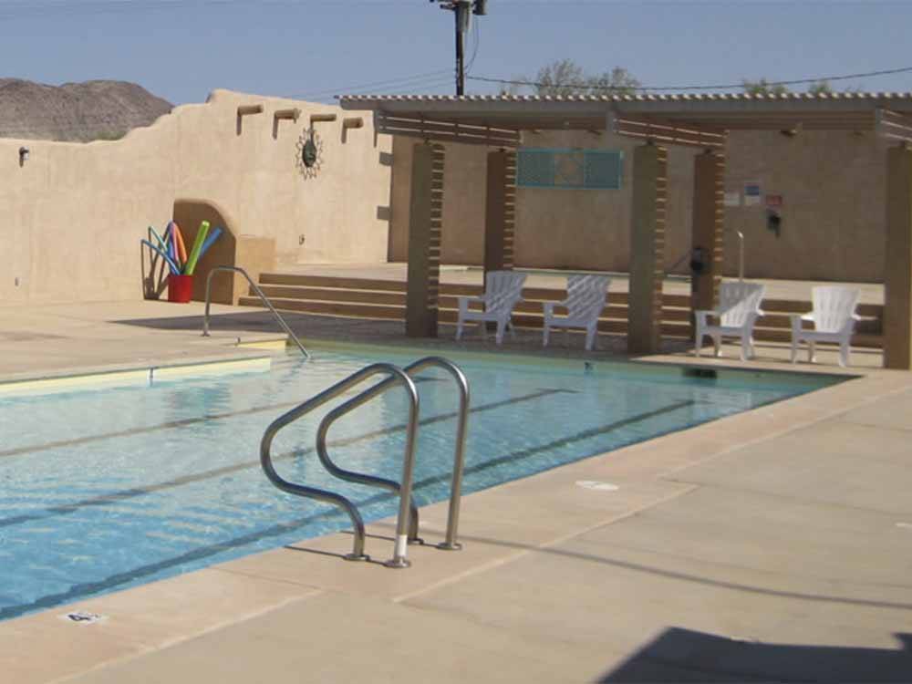 The swimming pool area at LEAPIN LIZARD RV RANCH