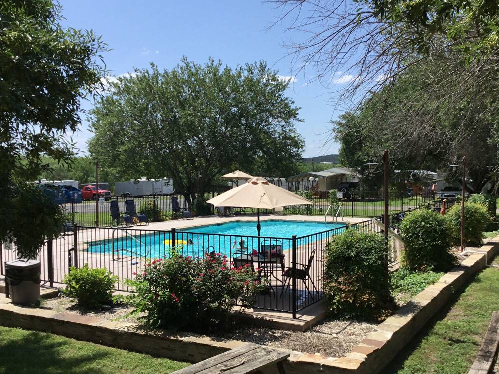 The swimming pool area at STONE CREEK RV PARK