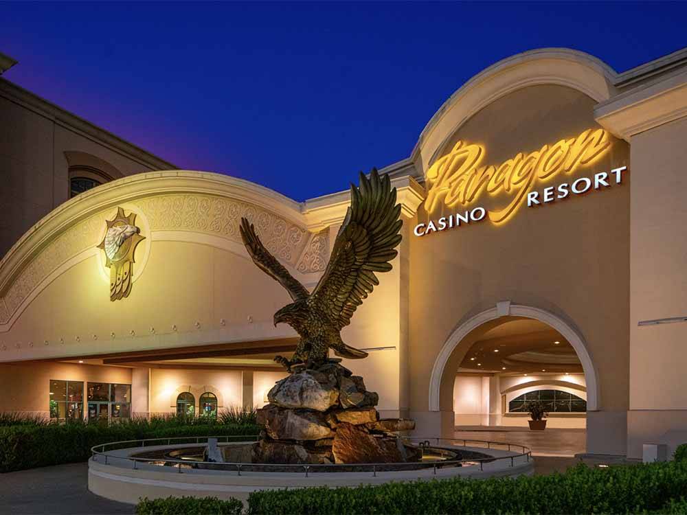 The front entrance with an eagle fountain at PARAGON CASINO RV RESORT