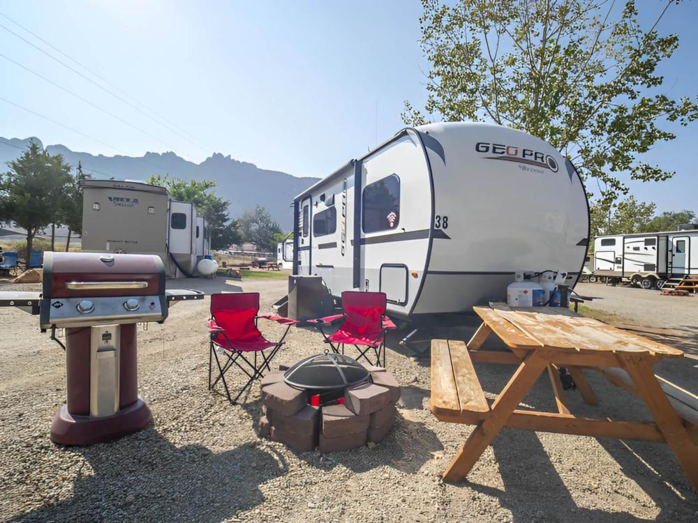 Parked trailer at site Moab RV & Glamping Resort
