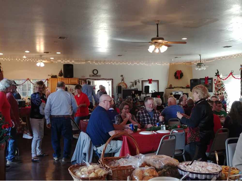 People gathered for a Christmas party at PATO BLANCO LAKES RV RESORT