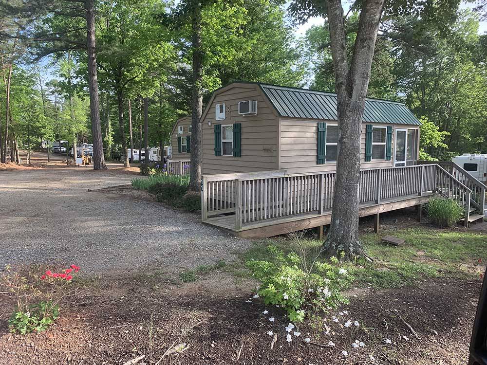A row of rental cabins at COZY ACRES CAMPGROUND/RV PARK
