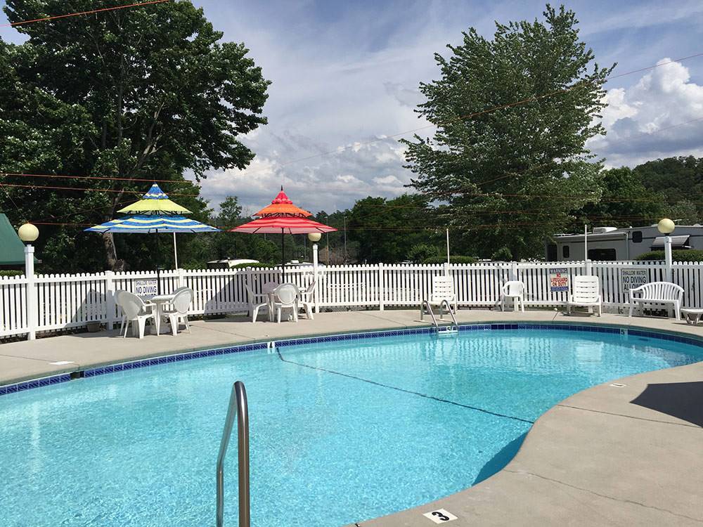 Community pool at campground clubhouse at KING'S HOLLY HAVEN RV PARK