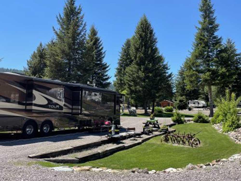 A Class A motorhome parked on-site at THE NUGGET RV RESORT