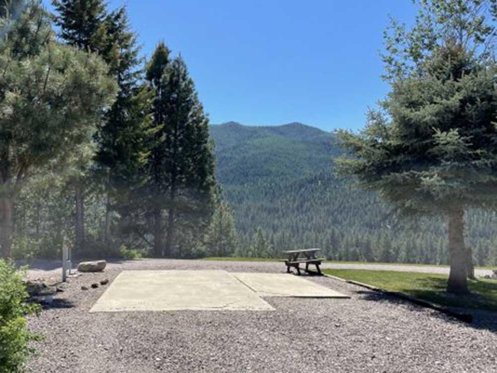 An open RV site with a beautiful view at THE NUGGET RV RESORT