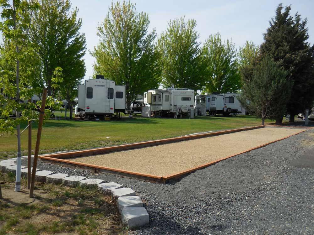 Gaming sandpit in front of RV units at PILOT RV PARK