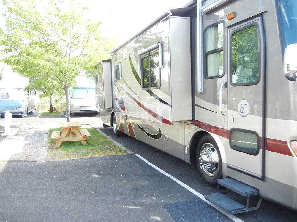 Class A motorhome at site with picnic table at GOLD DUST WEST CASINO & RV PARK