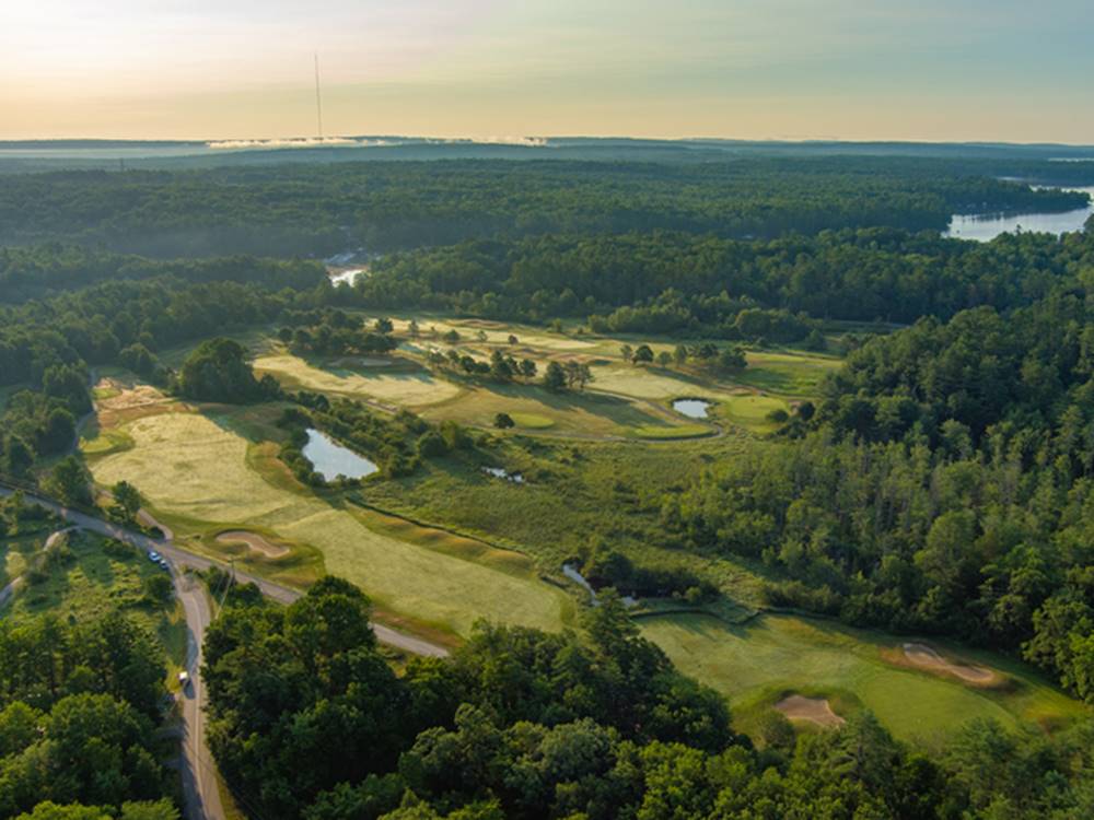 Aerial view of the property and surrounding area