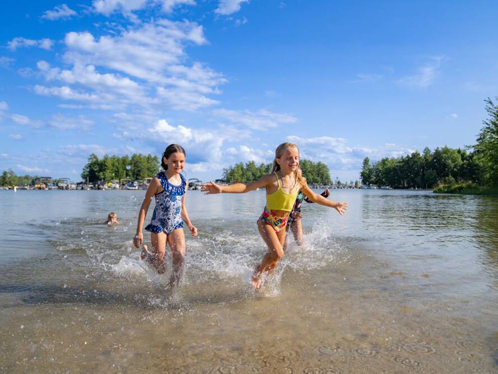 Girls running in the water