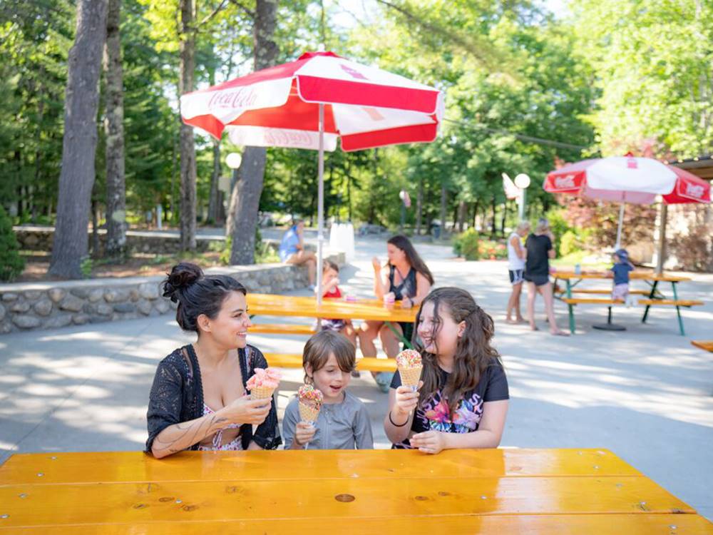 A family eating ice cream cones