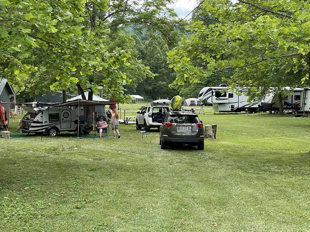 A group of grassy RV sites at SMOKY MOUNTAIN MEADOWS CAMPGROUND