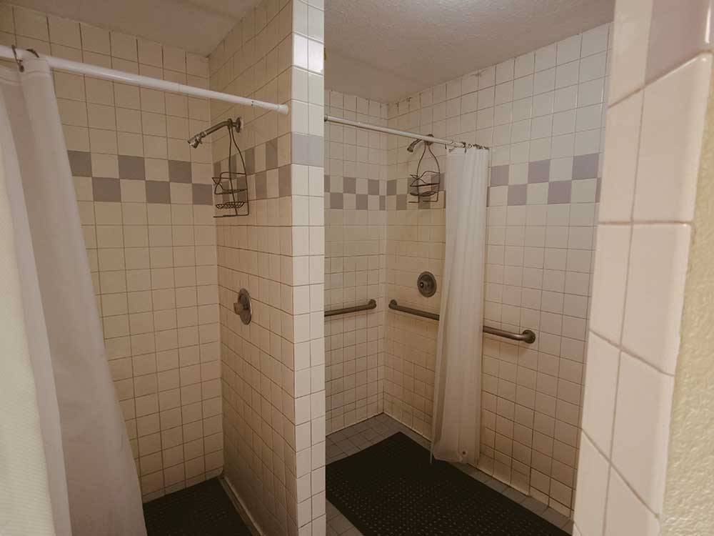 Private shower stalls for guests at NINETY-9 RV PARK