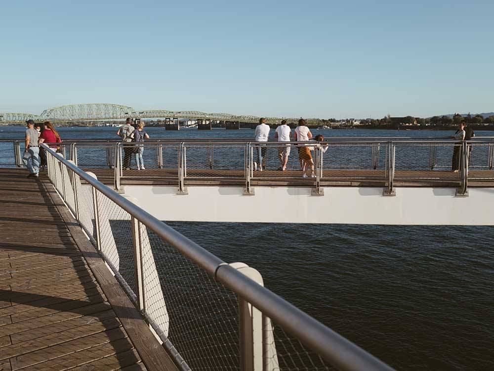 Long pier facing out to beautiful water views at NINETY-9 RV PARK