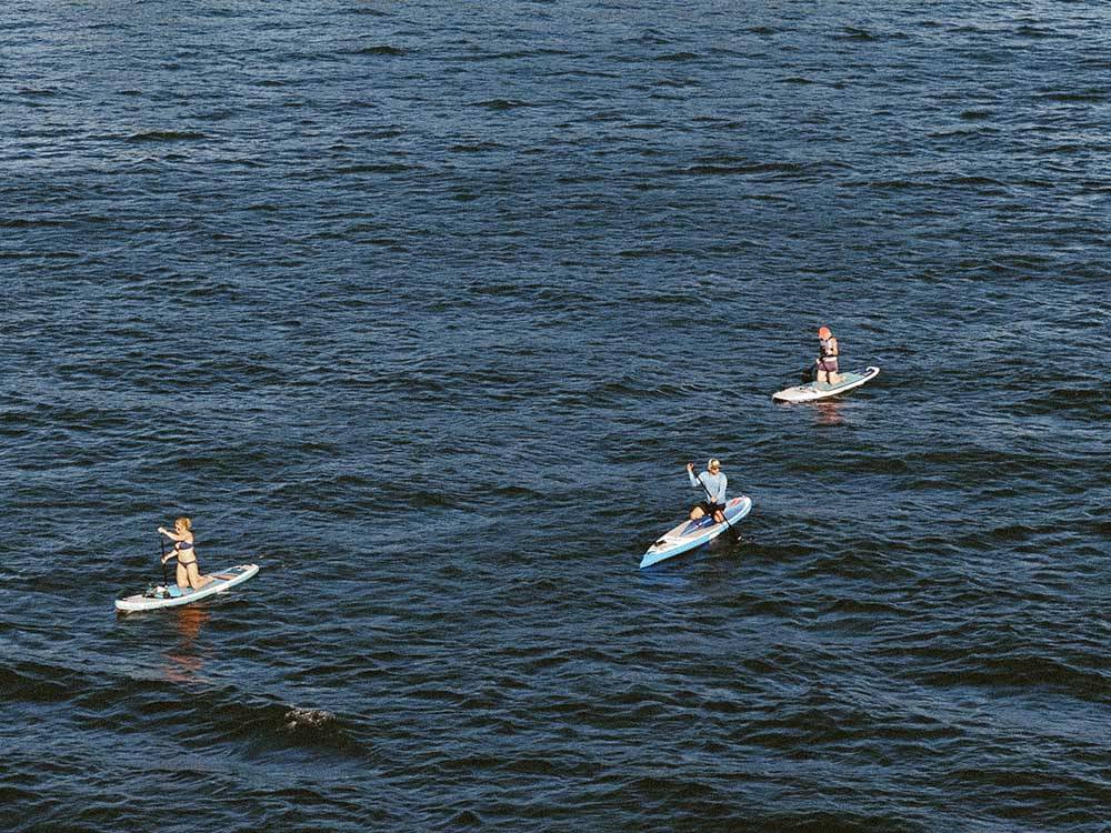 People spending time kayaking at NINETY-9 RV PARK