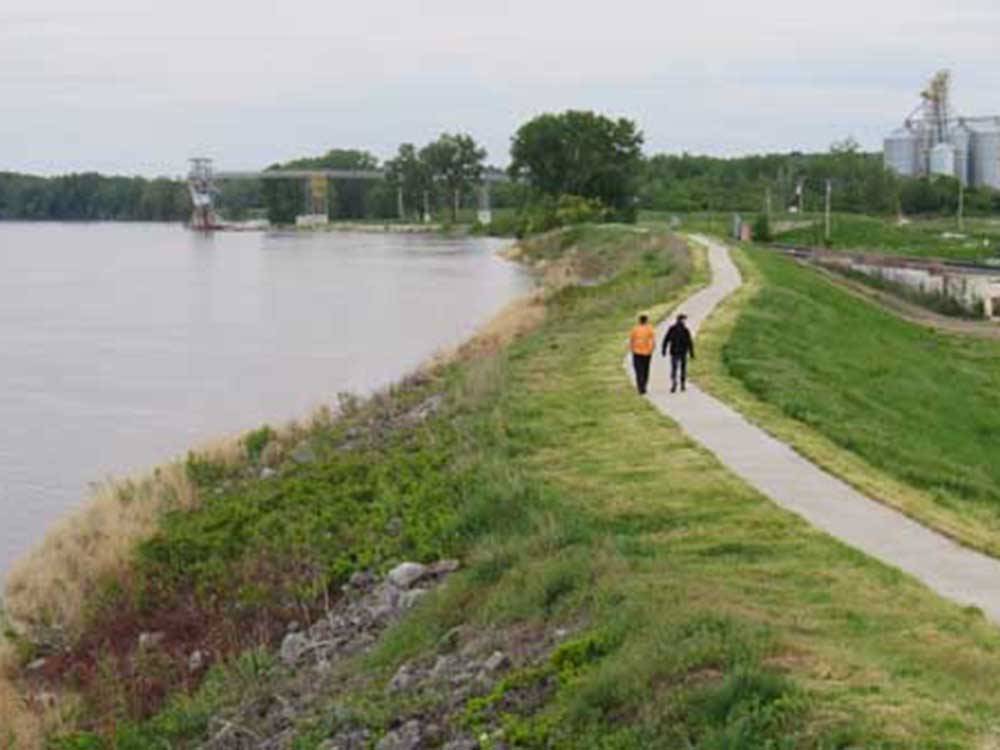 People walking along the levee near CITY OF CANTON MISSISSIPPI PARK