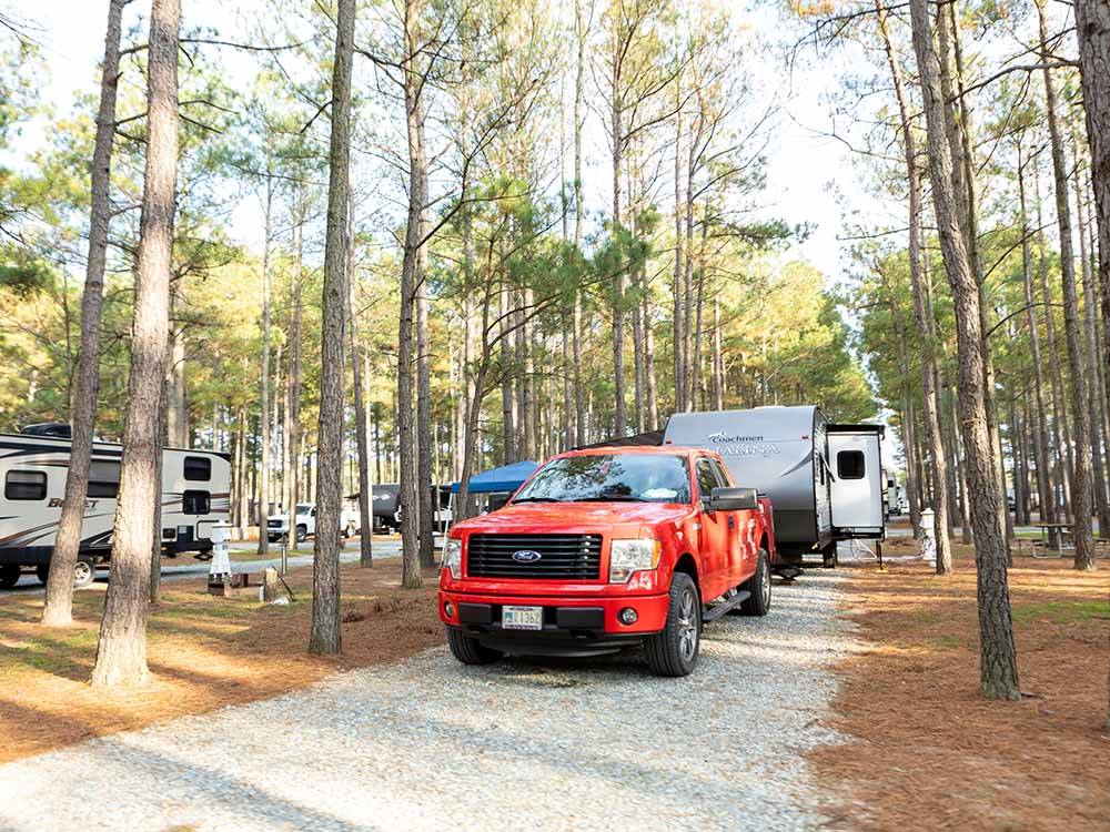 A fifth wheel trailer in a gravel site at SUN OUTDOORS CHESAPEAKE BAY