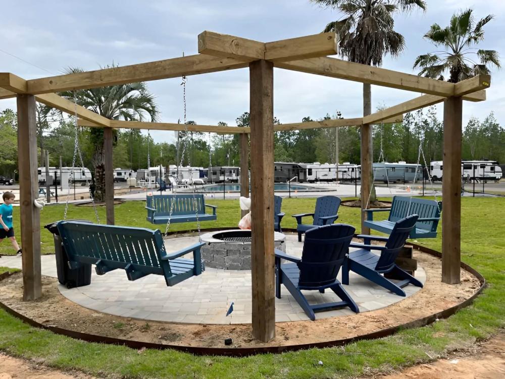 Fire pit at site Unhitched Garcon Point (fka Pelican Palms RV Park)