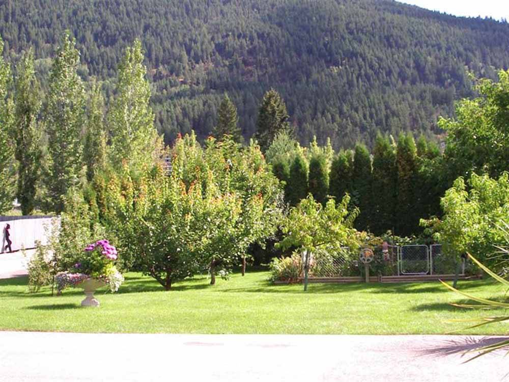 View of lush trees and flowers at PAIR-A-DICE RV PARK