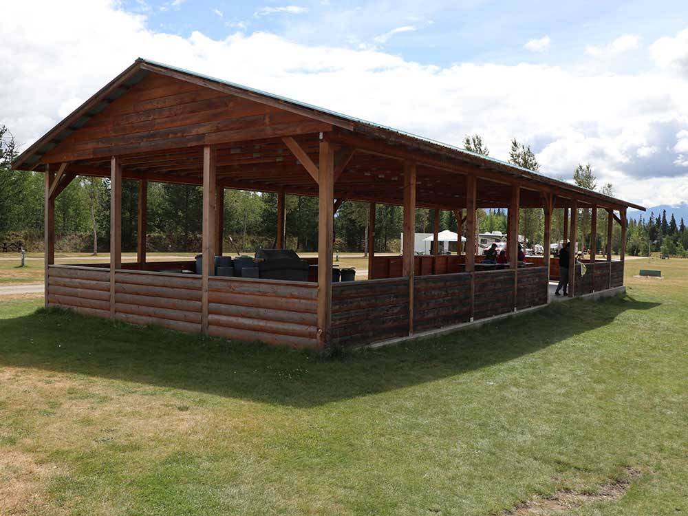 Picnic area with wooden canopy at IRVIN'S PARK & CAMPGROUND
