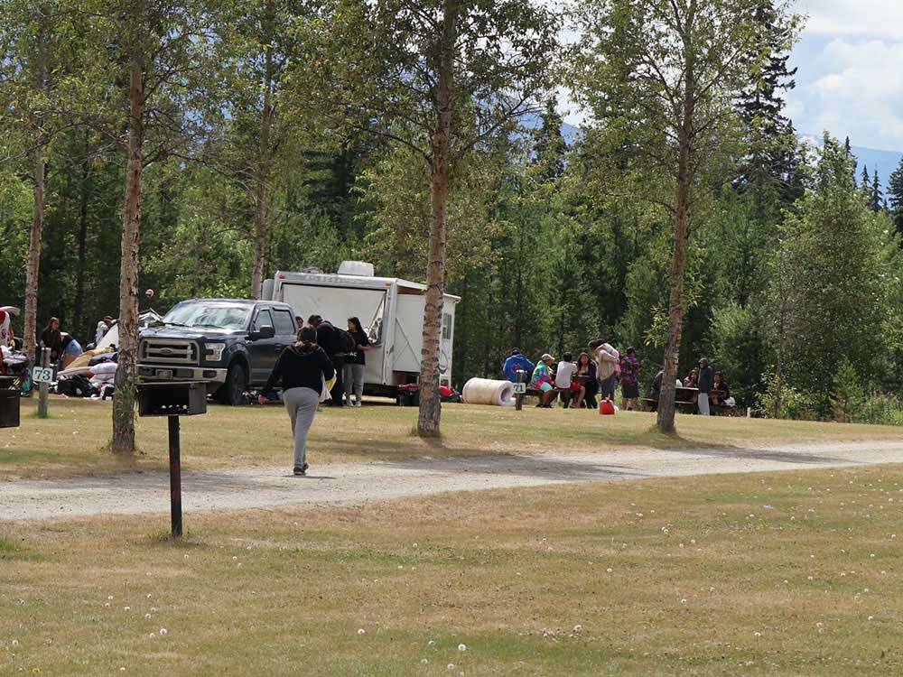 Campsite with truck and trailer at IRVIN'S PARK & CAMPGROUND