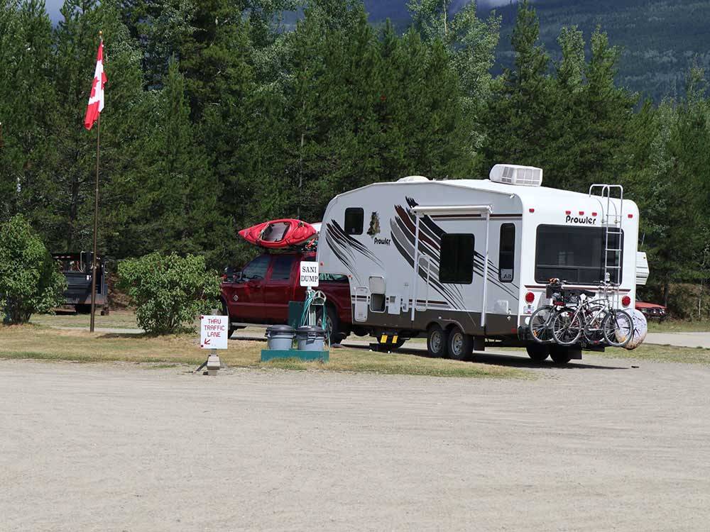 Fifth-wheel in site with Canadian flag at IRVIN'S PARK & CAMPGROUND