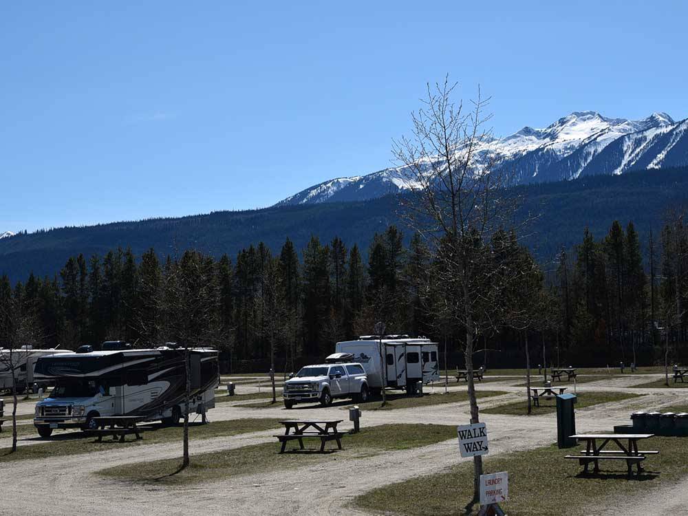 A view of empty and occupied gravel sites at IRVIN'S PARK & CAMPGROUND