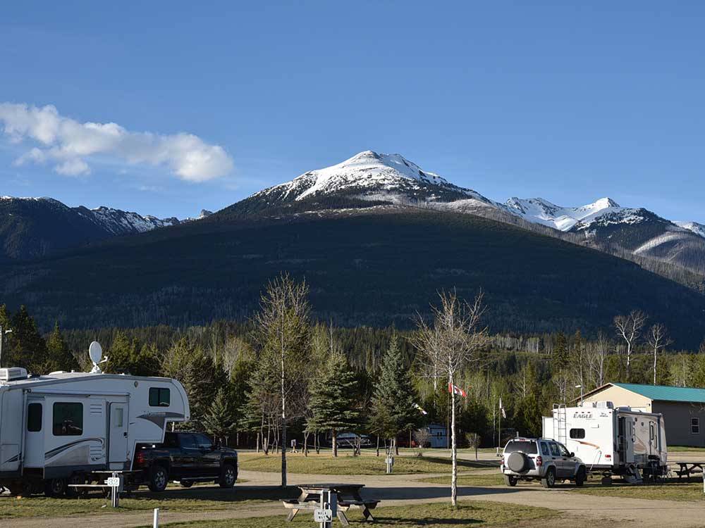 Travel trailers parked in RV sites at IRVIN'S PARK & CAMPGROUND