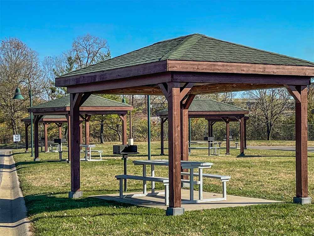 Grassy area with four gazebos at DRAFTKINGS AT CASINO QUEEN RV PARK