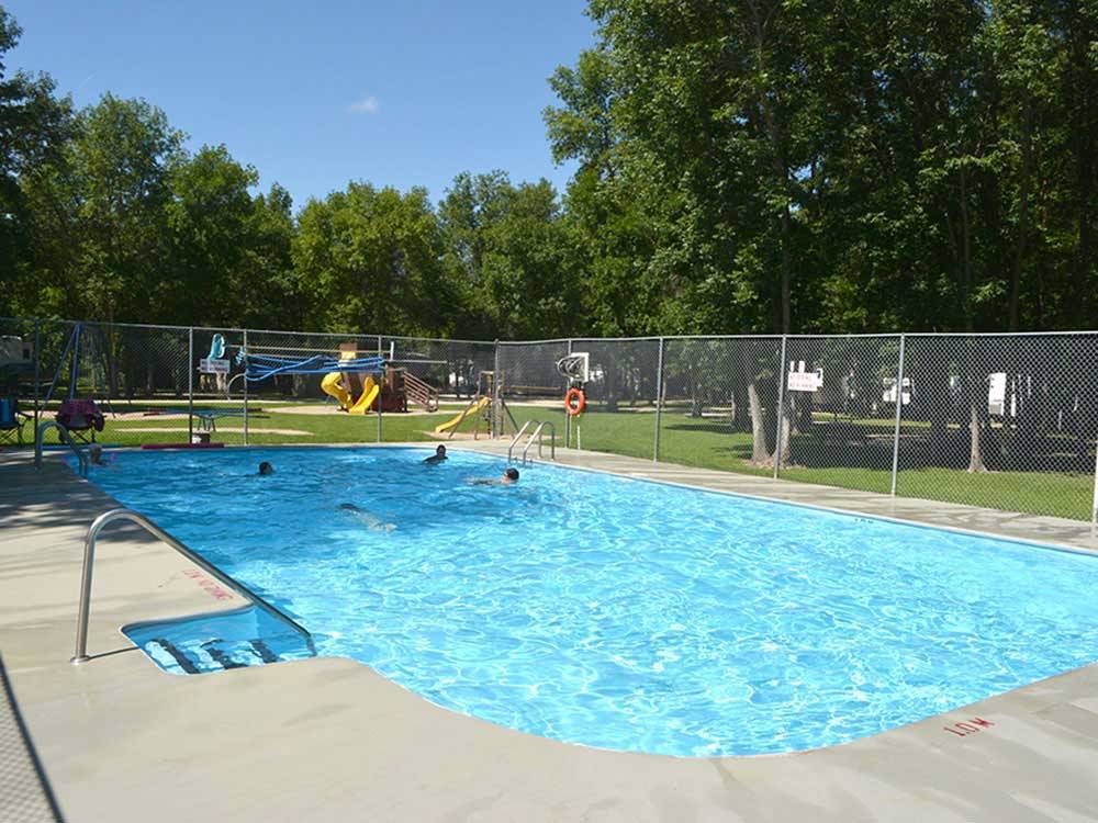 Kids swimming in the pool at MILLER'S CAMPING RESORT