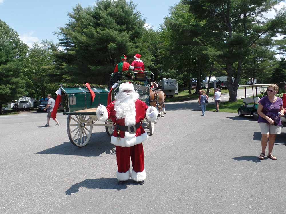 Santa standing in the middle of the street at SUGAR RIDGE RV VILLAGE & CAMPGROUND