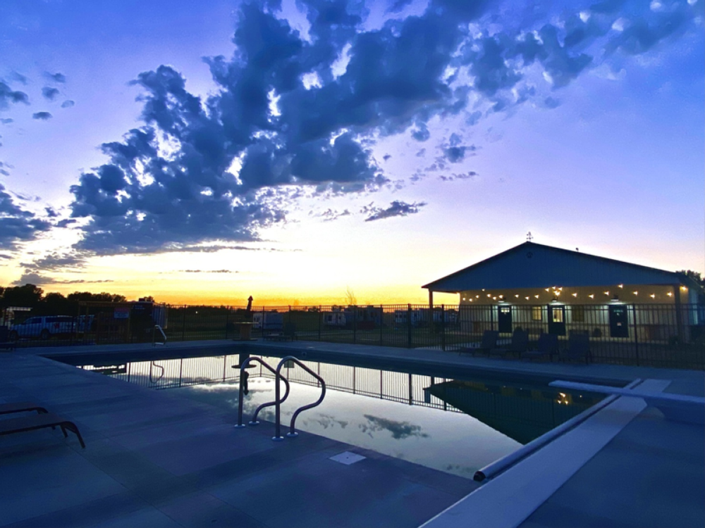 Swimming Pool at Sunset Blue Oasis