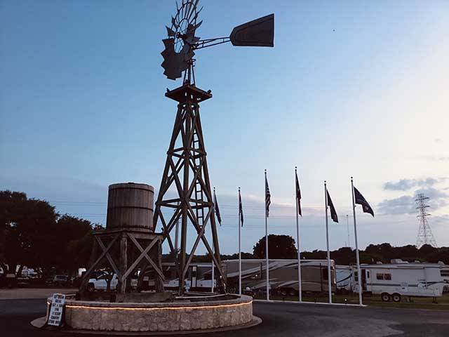 Our windmill and flag poles at sunset!