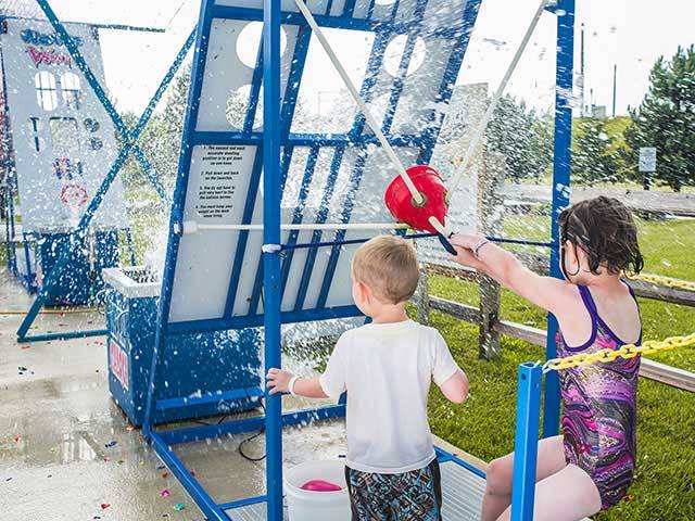 Get wet with kids playing water wars